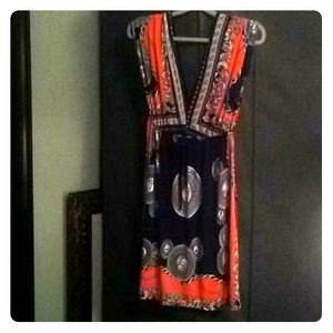 Black dress with white and orange accents